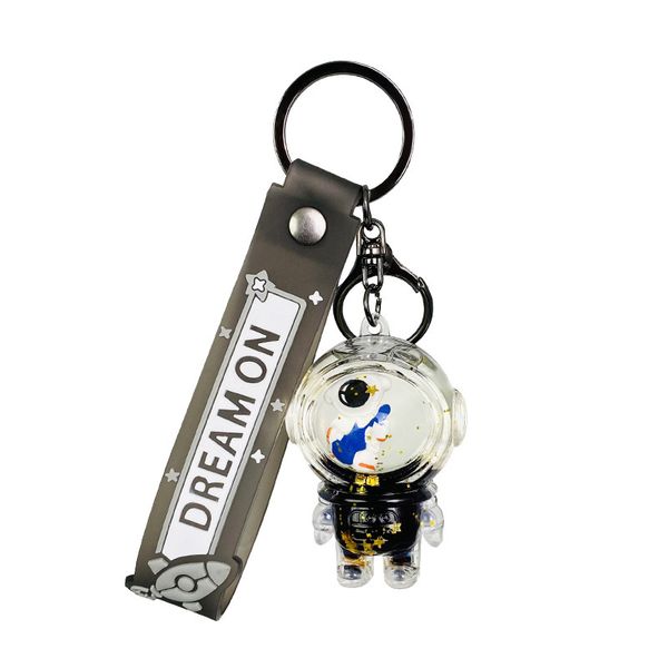 Black and Gold Astronaut Floating Bottle - Guitar Keychain