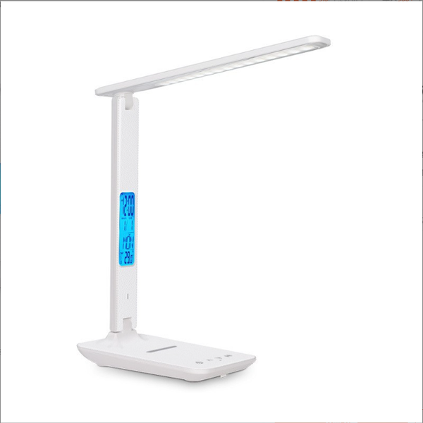 LED desk lamp with wireless charging capability