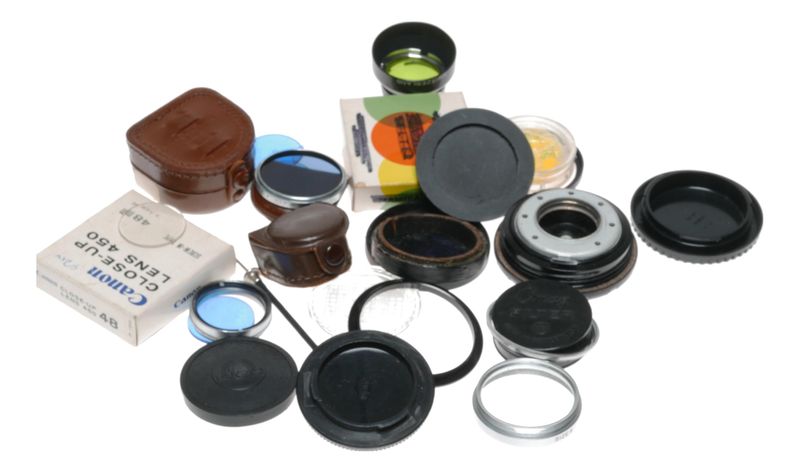 Vintage camera cable and case and filters and caps accessories