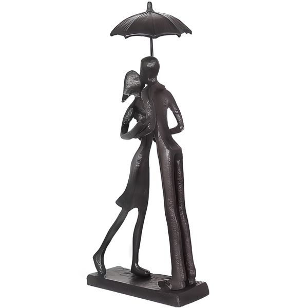 Metal handicraft umbrella with a statue of people kissing under it