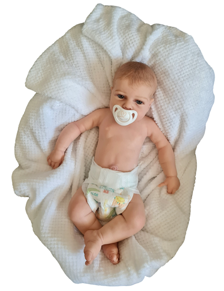 Fullbody Silicone Drink and Wet Awake reborn baby doll that can bath.