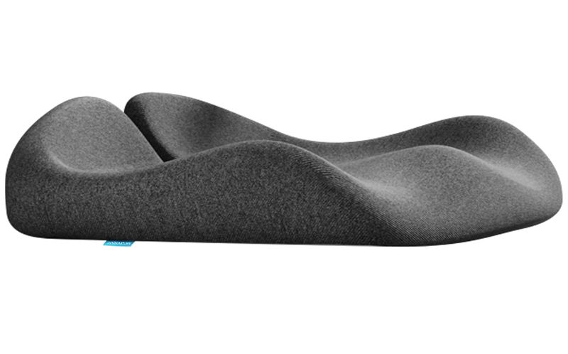 Pressure - relief seat cushion, crafted from extra - dense memory foam.