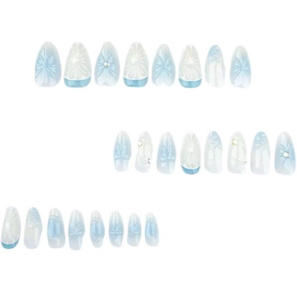 Blue Gradient Nail Art Paired With Bow Shaped False Nails