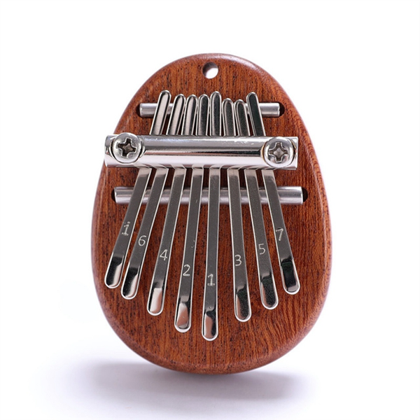 Mini Thumbhard 8-Tone Piano Musical Good Portable Instrument Gift