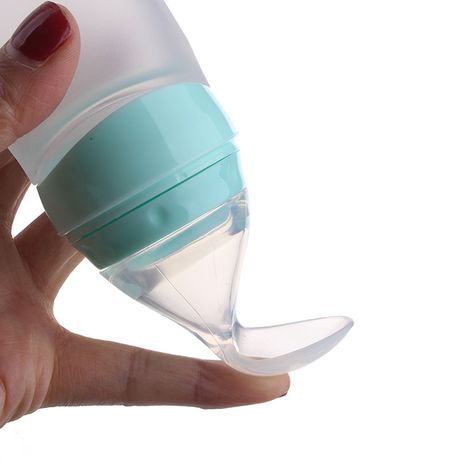 Silicone feeding bottle with hot sale spoon