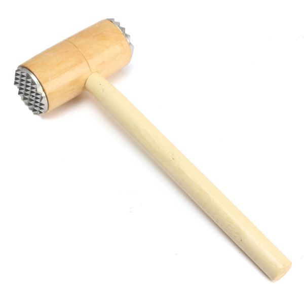 Meat Tenderising Mallet on a Wooden Board