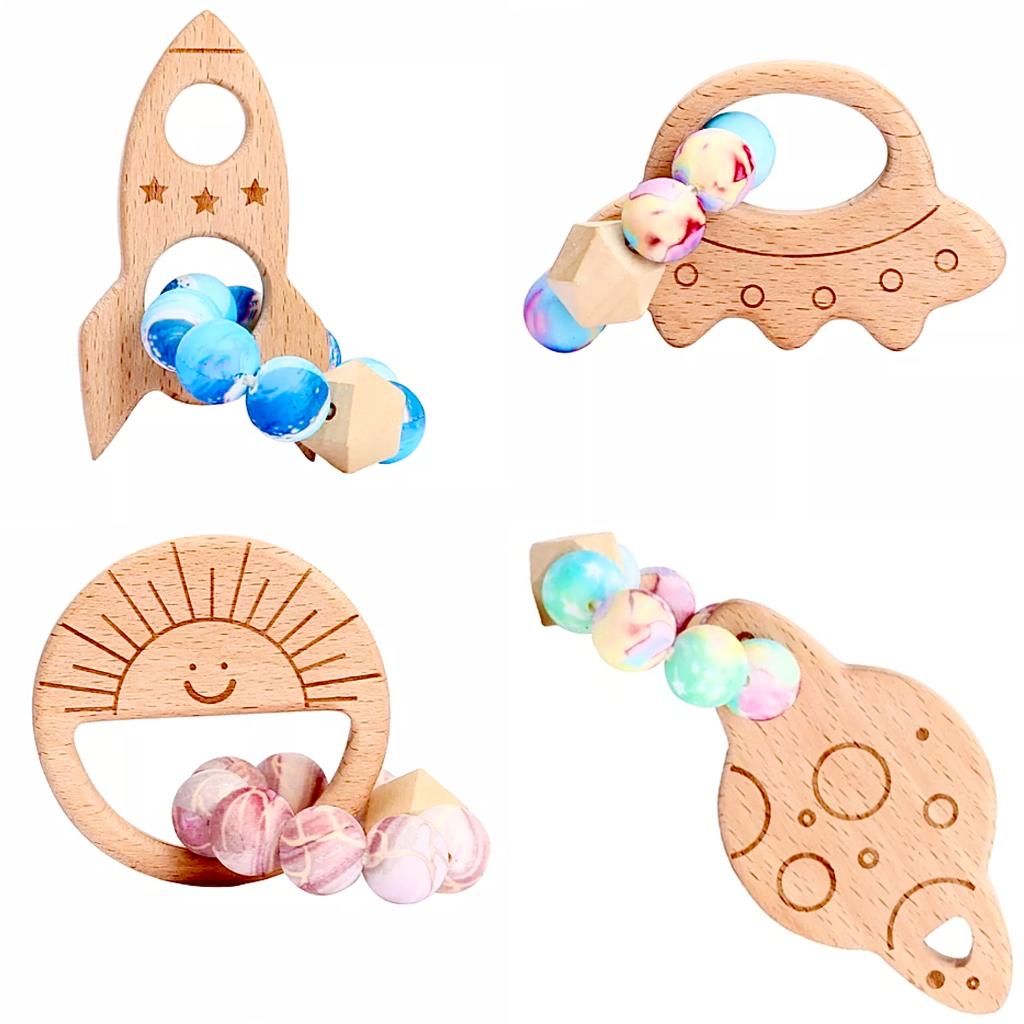 Silicone beads and wood universe themed teethers 4pc Shop Today. Get