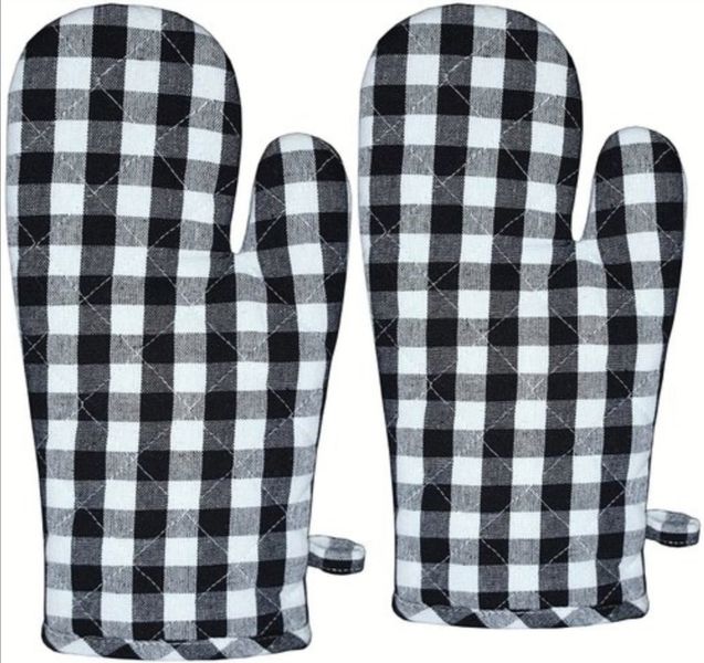 Black and white oven gloves