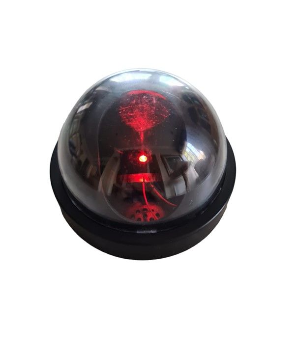 Dummy camera with battery powered flashing light (batteries not