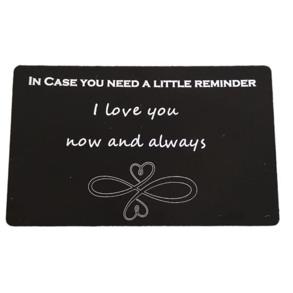 Black aluminum credit card message engraved: I case you need a reminder