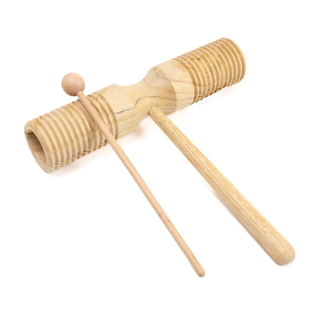 Wooden instrument with deals grooves