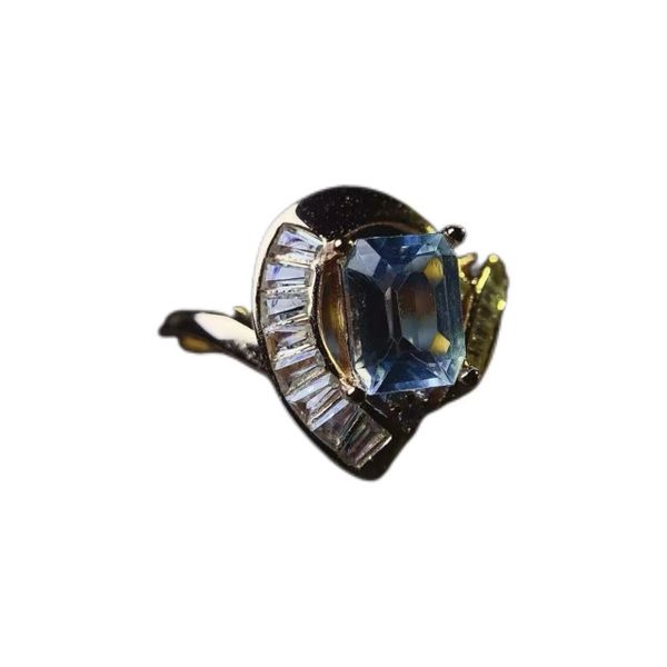 Elegant Aquamarine Ring With Square Diamonds And Irregular Shape