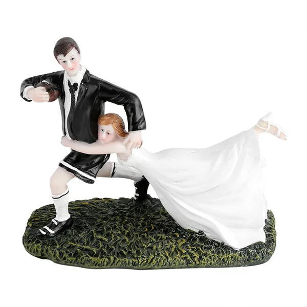 Bride and Groom with Rugby Ball Cake Topper