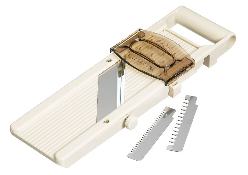 Vegetable Slicer Fitted With A Safety Holder