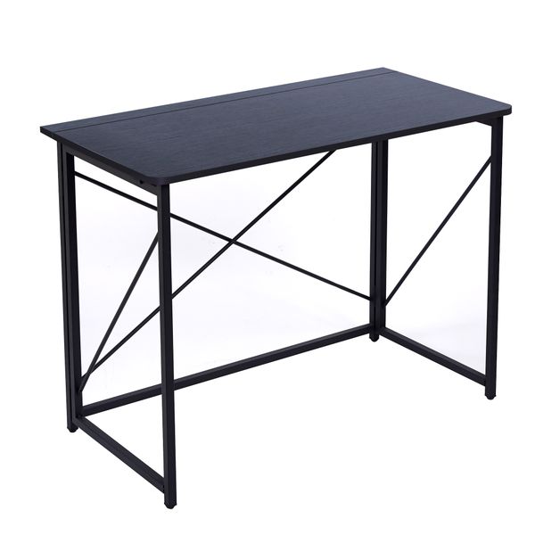 Compact Folding Desk Tucks Flush Against The Wall For Space-Saving Storage.