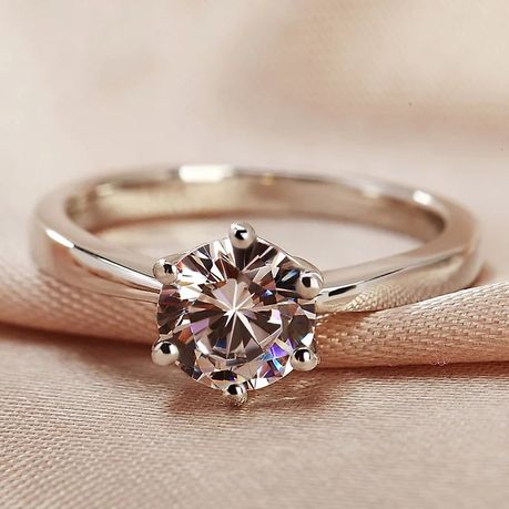 Gold plated store solitaire ring