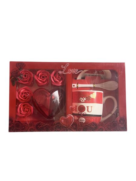Valentine's Day gift set that includes a ceramic mug, a matching spoon,