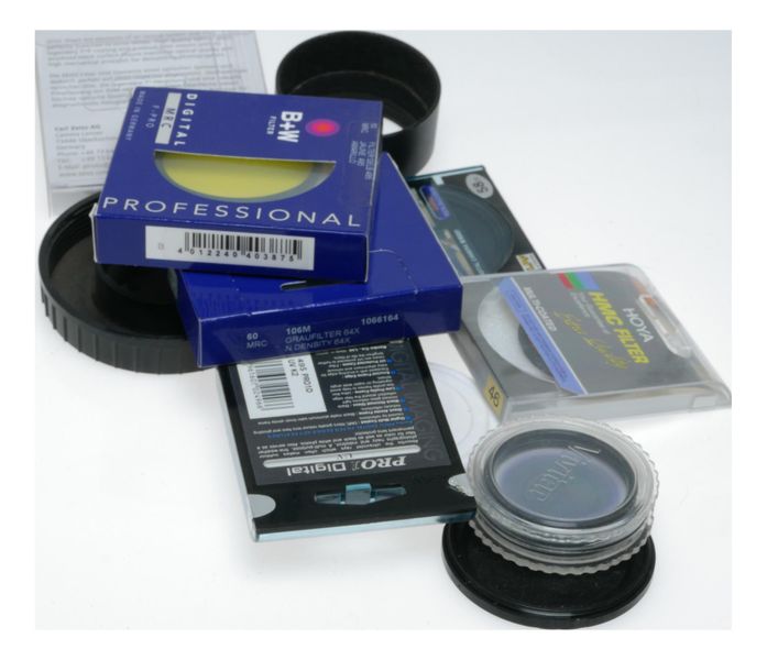 Vintage camera cap and hood and filters and case accessories