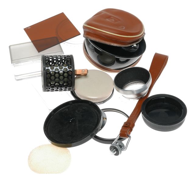 Vintage camera caps and pouch and filters and strap and hood accessories