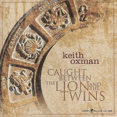 Keith Oxman - Caught Between The Lion And The Twins (CD)