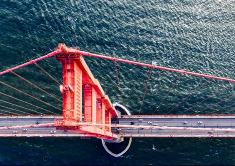 workART Curated Photographic Canvas - Red Wide Bridge by Denys Nevoz