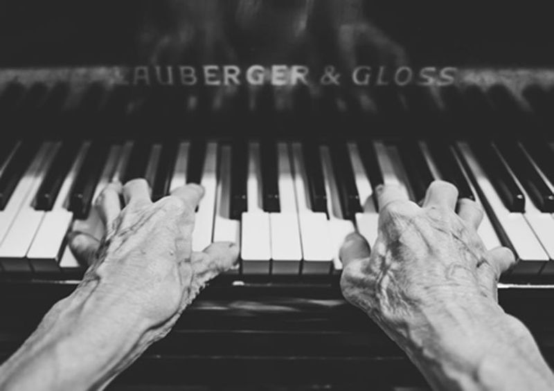 workART Curated Photographic Canvas - Piano Playing Hands by Lukas Budimaier
