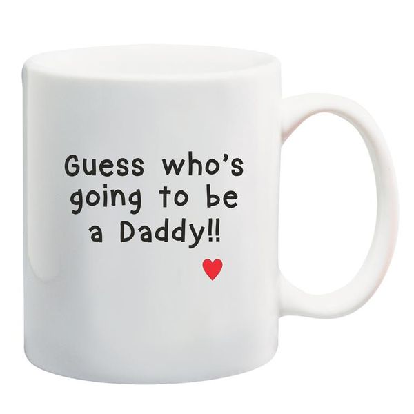 Qtees Africa Guess Who's Going to be a Daddy Mug